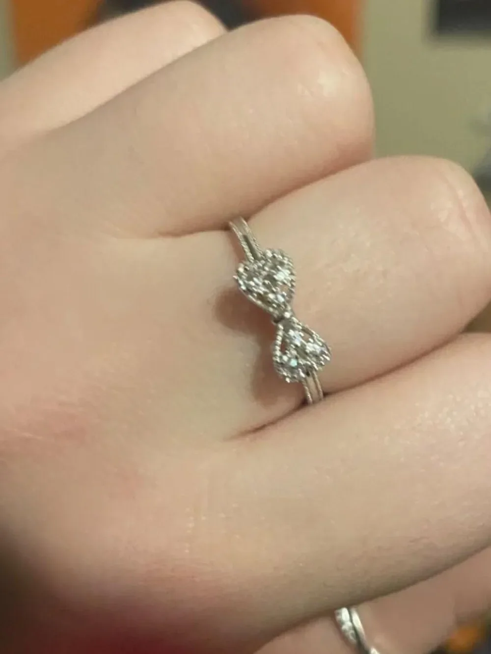 .925 Sterling Silver with White Diamond Cubic Zirconia Infinity Forever Bow Ring